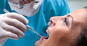 Relaxed female patient in dental chair