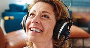 Smiling woman with headphones