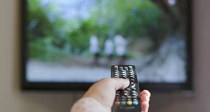 Remote control pointed at tv