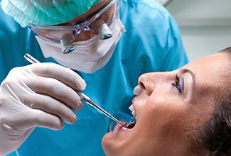 Woman receiving dental exam