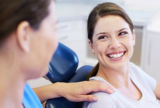 Smiling woman in dental chair