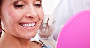 Woman receiving dental treatment