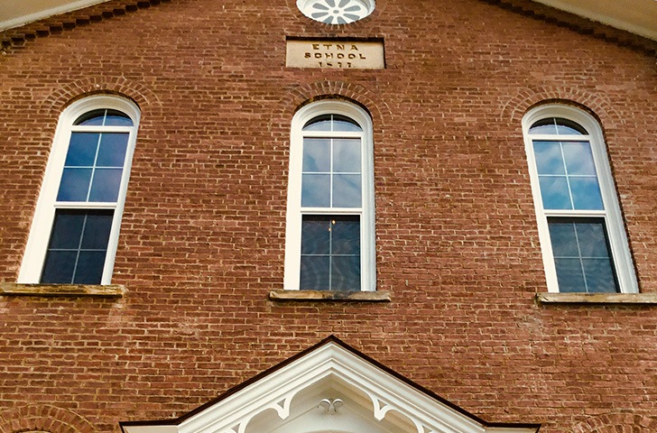 Original school plaque over front door