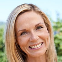 Smiling older woman outdoors