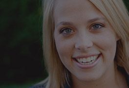 Smiling young woman outdoors