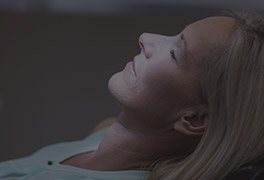 Relaxing woman in dental chair